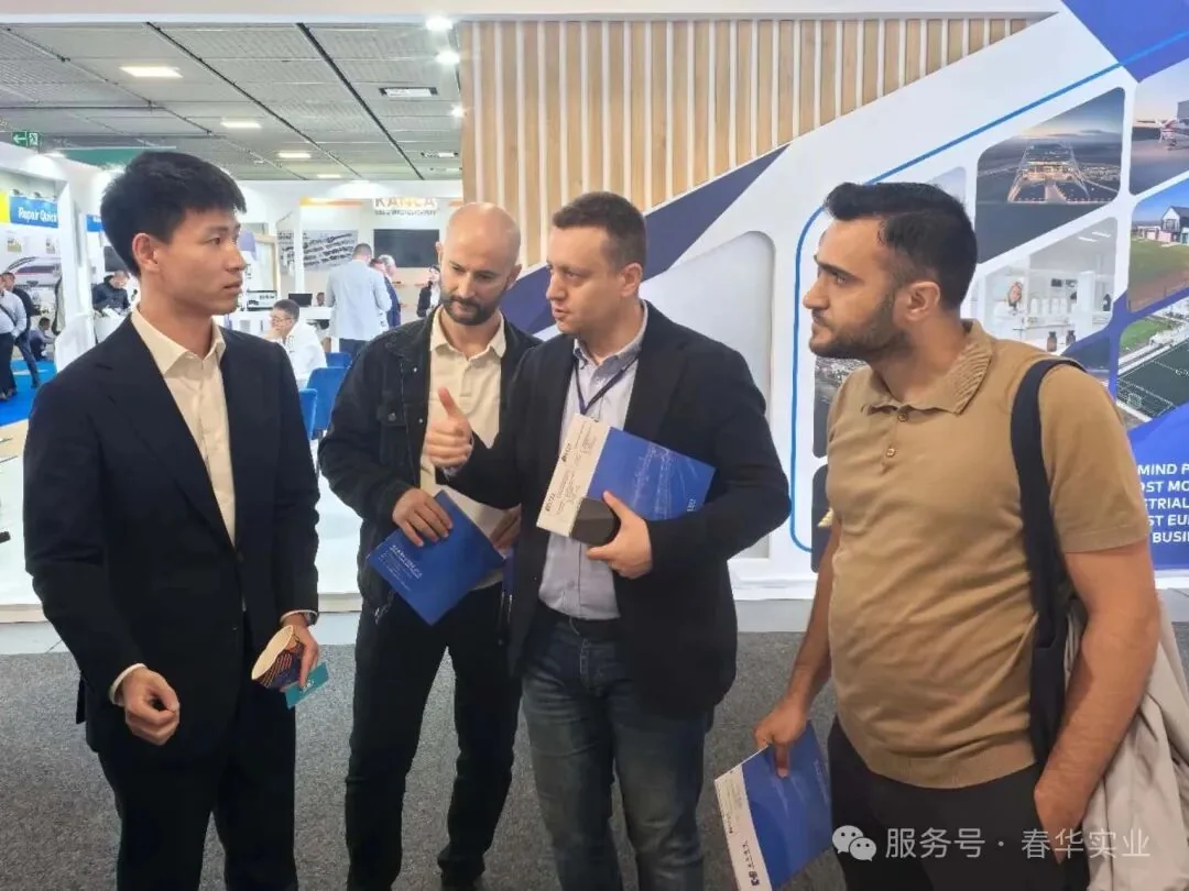 Chunhua team members discussing product information with visitors at InnoTrans 2026
