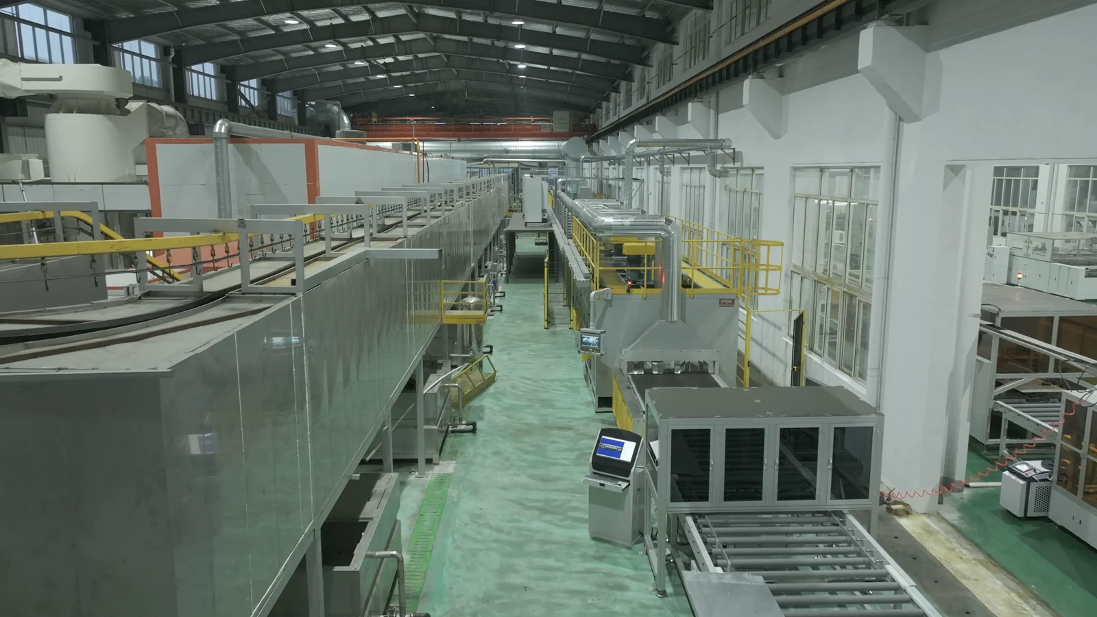 Automated brazing furnace line with extraction ducts and a service walkway